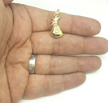 Load image into Gallery viewer, 14k yellow gold 3D hollow dollar sign money bag lucky pendant charm gift 1.4g
